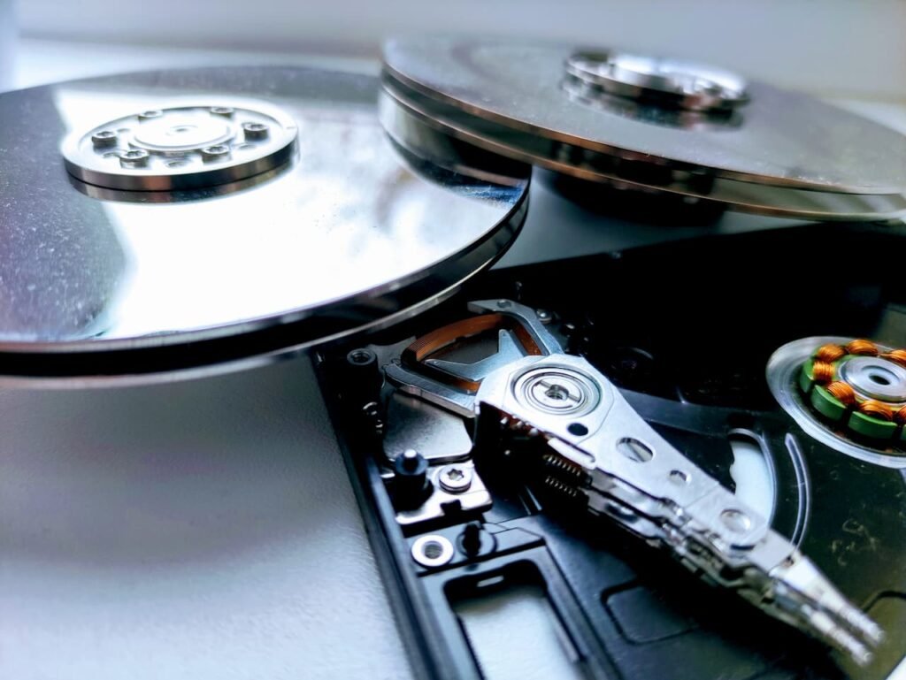 Platinum coated platters and the frame of hdd disks taken apart